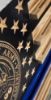 Thin blue line flag with coin racks